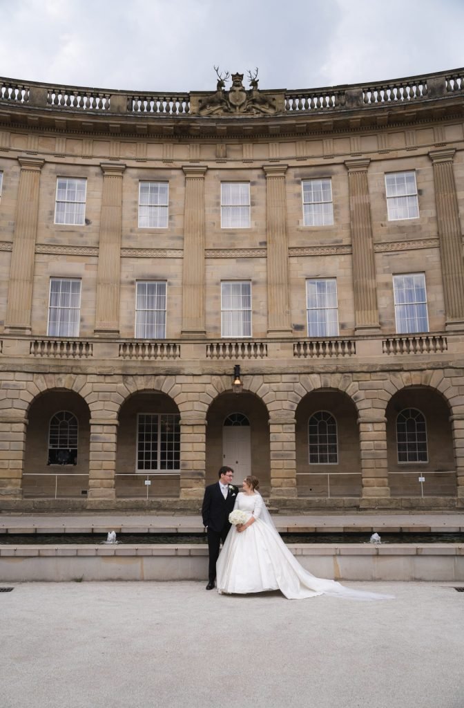 Wedding photography at the Crescent in Buxton, capturing the joy and beauty of a couple in love surrounded by stunning architecture